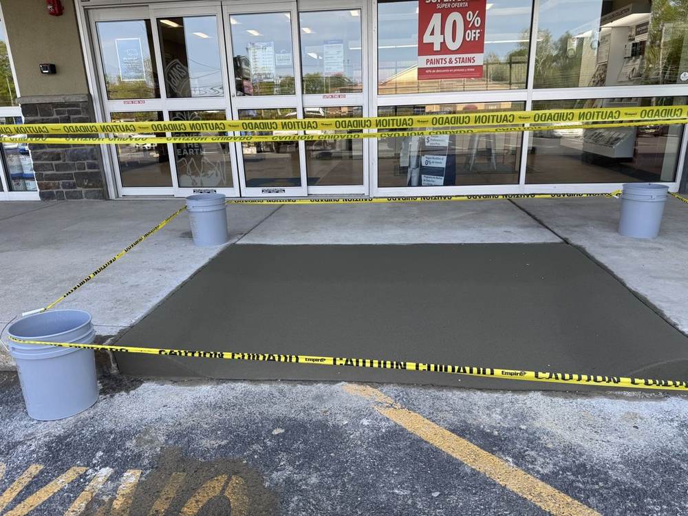 Commercial concrete entrance pad in front of a storefront by South Jersey Construction Enterprise