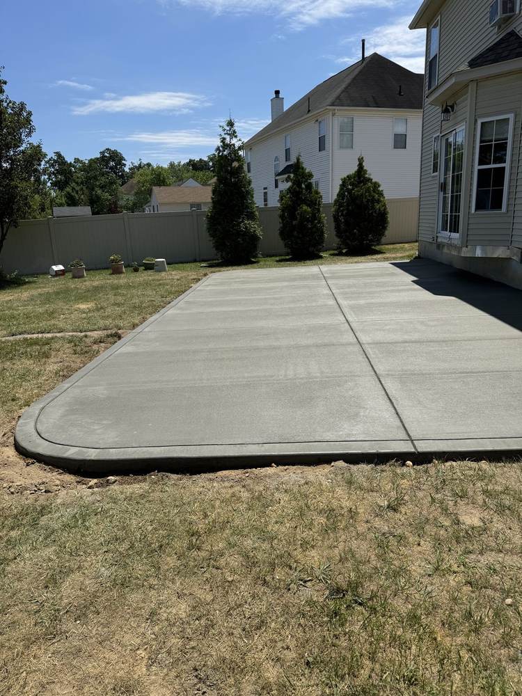 Smooth new concrete porch floor installed by South Jersey Construction Enterprise