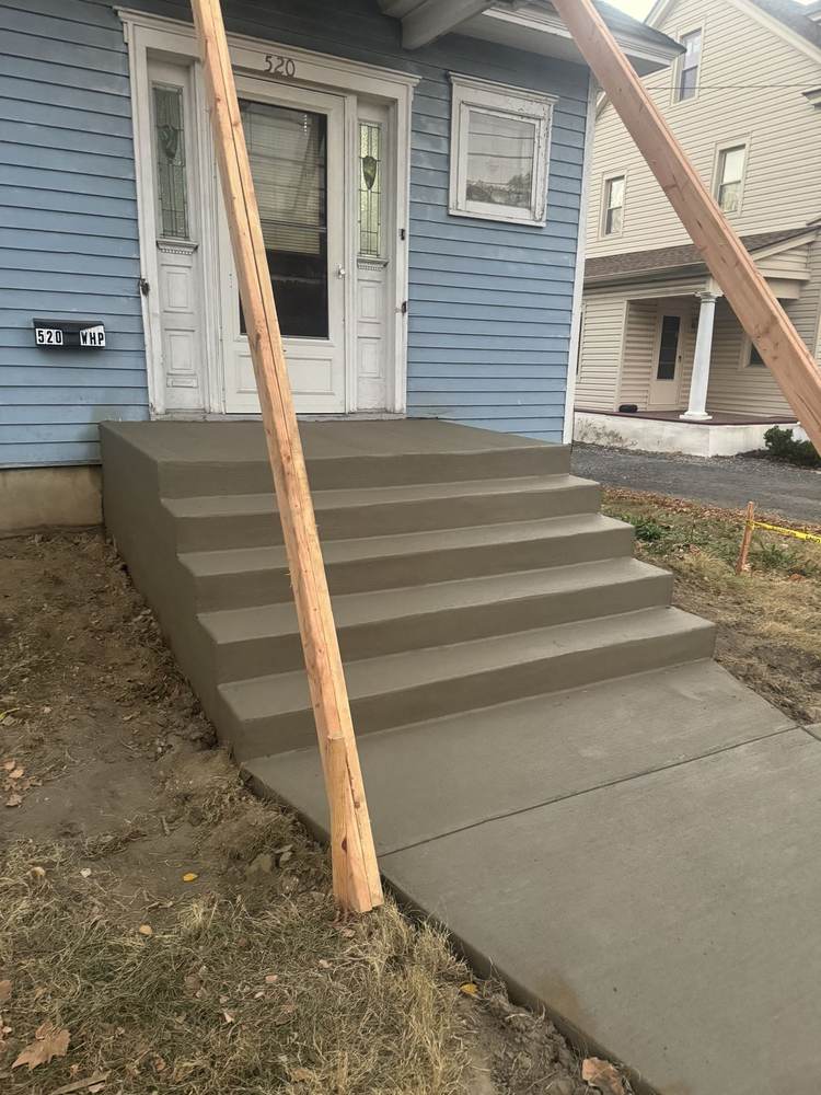 New concrete porch steps and walkway installed by South Jersey Construction Enterprise
