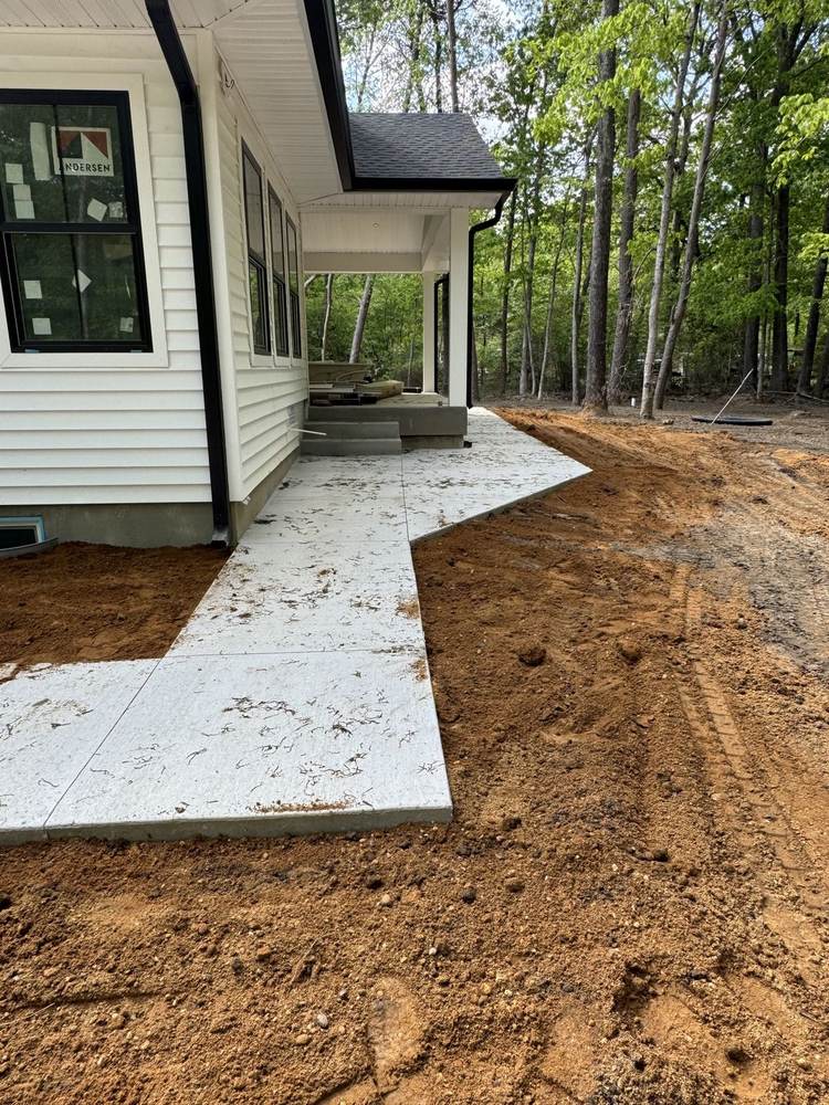 New concrete porch steps and walkway installed by South Jersey Construction Enterprise at a new-construction home
