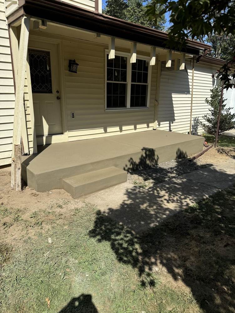 Concrete porch stoop with step by South Jersey Construction Enterprise