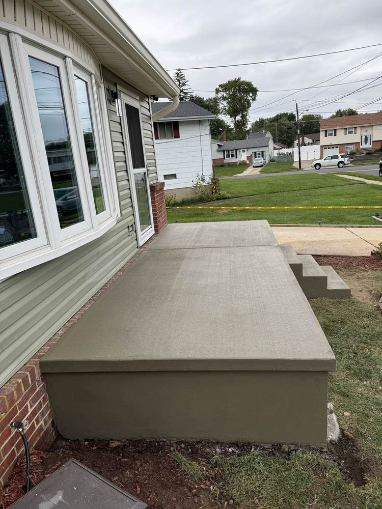 Concrete porch with steps by South Jersey Construction Enterprise