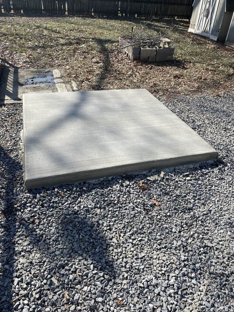 Small concrete shed pad on a gravel base installed by South Jersey Construction Enterprise