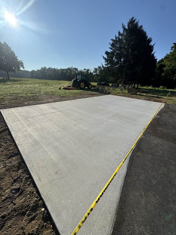 Large concrete slab poured on a rural property by South Jersey Construction Enterprise